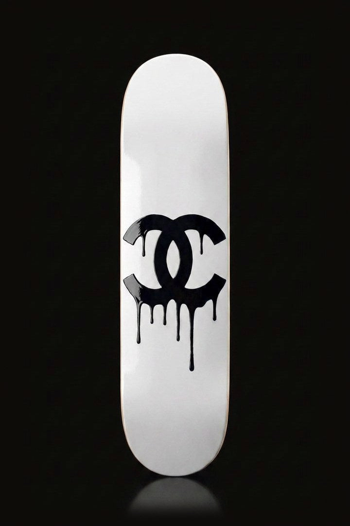 Monogram Drip skateboard deck wall art - dripping black monogram on gloss white - front view
