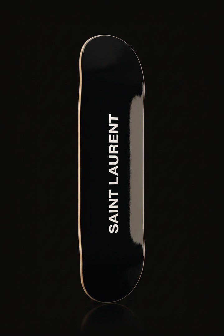 Saint Laurent skateboard deck wall art - gloss black deck with white vertical type - front view