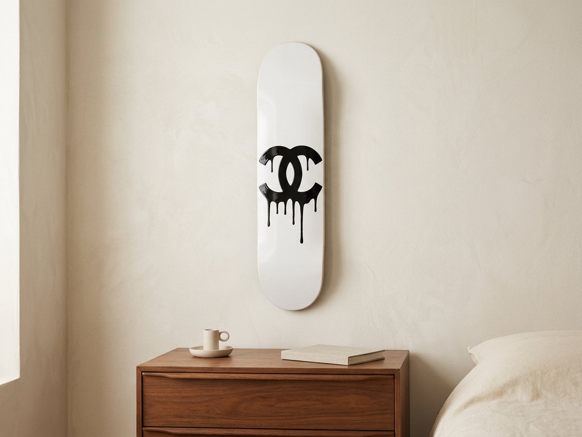 Monogram Drip deck above a walnut dresser in a warm bedroom